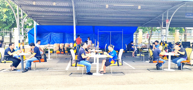 Employees keeping social distance