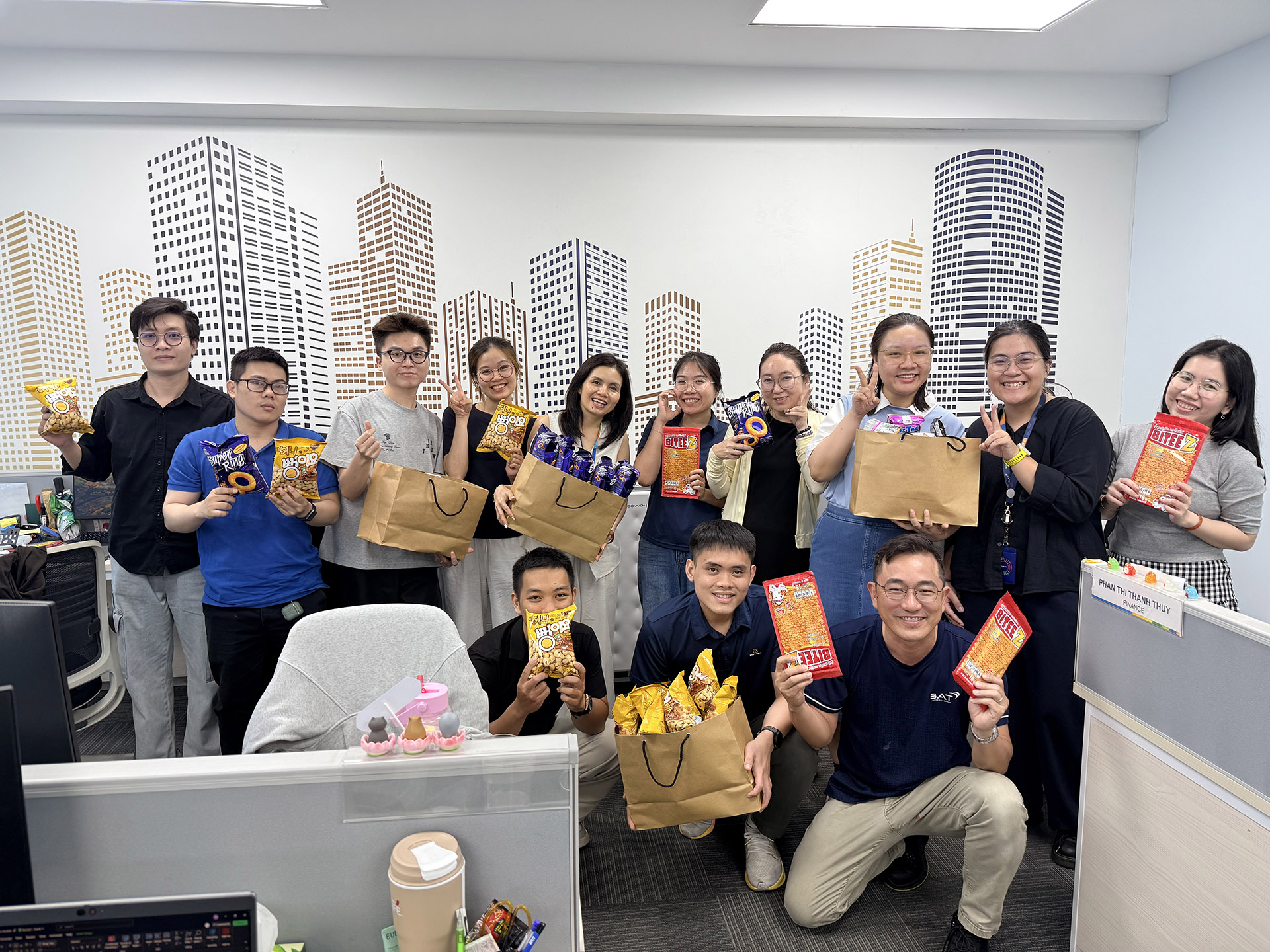 Employees selecting snacks from around the world