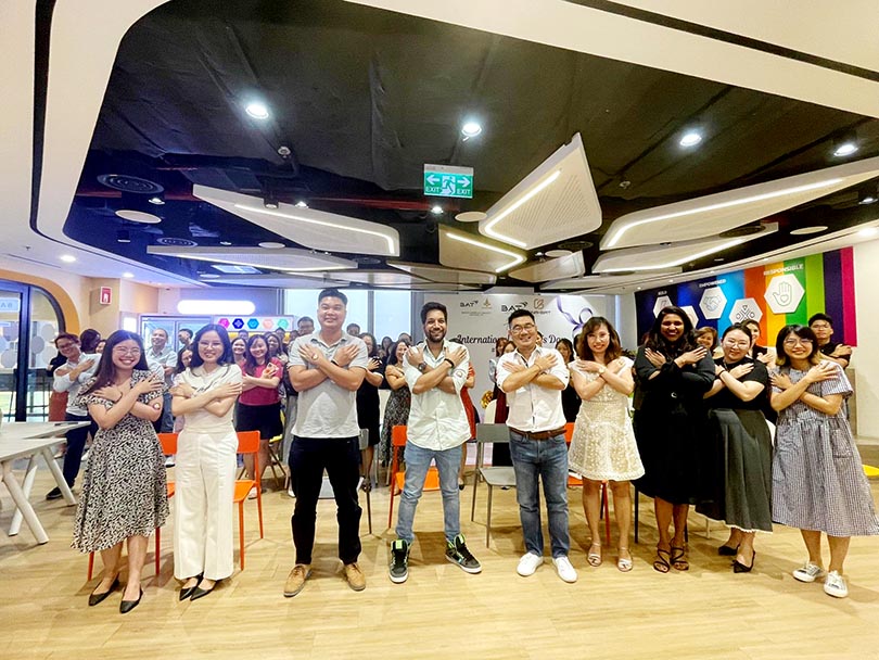 Representatives of the leadership team and employees together pledge to embrace equity